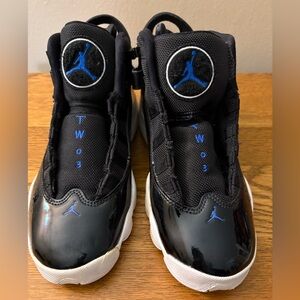 Women’s size 6.5 Air Jordan six rings basketball sneakers.